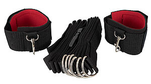 Belt bondage set to bed